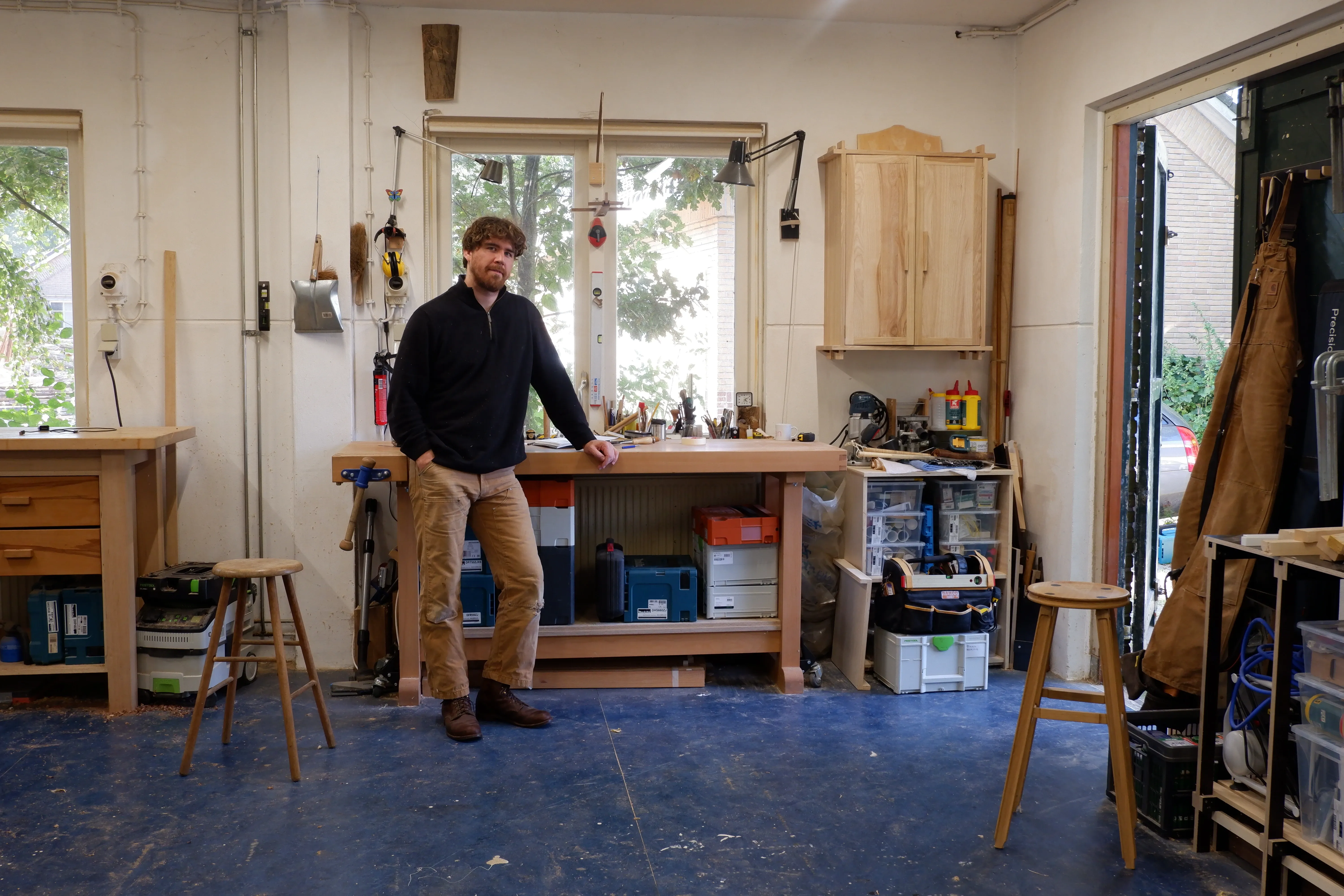 Woodworker shaping timber in the workshop